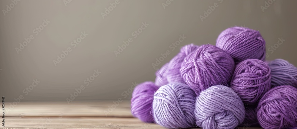 Aufkleber Purple Merino wool balls arranged on a table with copy space image