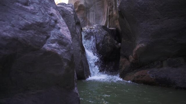 El Remate waterfall between high cliffs in Argentina. Slow-motion video of water flowing.