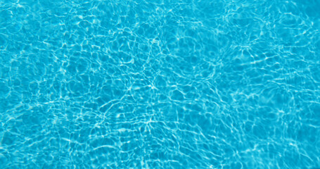 Water in the pool on a hot sunny day.