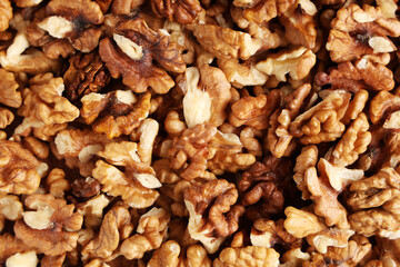 Texture of tasty peeled walnuts as background
