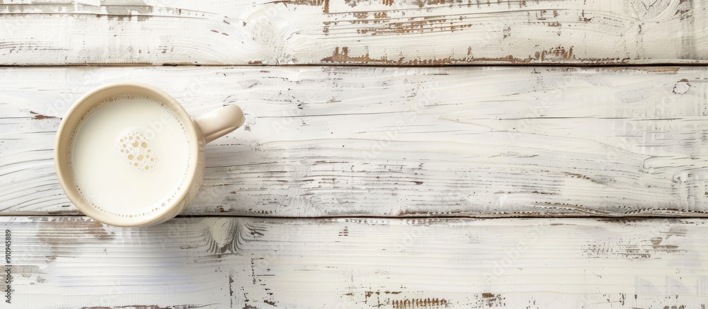 Poster white wooden table background with a mug of milk suitable for any copy space image