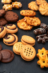 Mix of cookies . Many unhealthy snacks . Top view