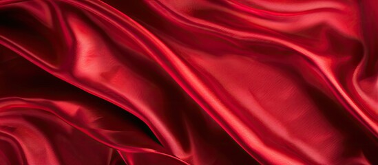 Obraz premium Background of red satin or silk fabric with copy space image available