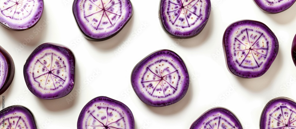 Poster Eggplant slices arranged in circular pattern on white backdrop Isolated with copy space image for decorative frame or border on a food themed background