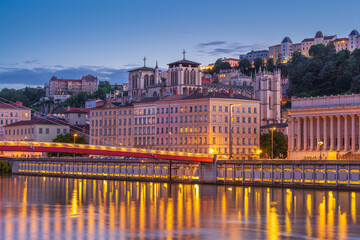 Fototapeta premium View of View Lyon District with the Gothic Cathedral and the Saone River at Blue Hour, France