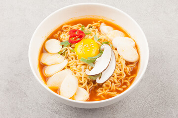  An instant food made by steaming noodles, frying them in oil, and then drying them. Add powdered soup separately.
