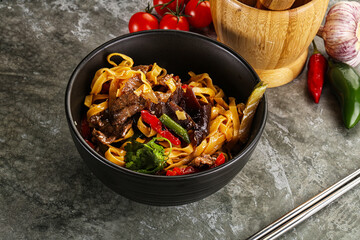 Asian wok with noodle, vegetables and beef