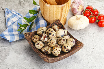 Raw quail eggs in the bowl