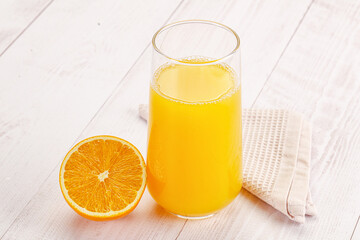 Sweet fresh orange juice in the glass