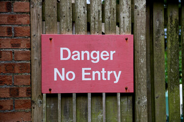 Danger No Entry Signboard on an Old Country Estate Gate