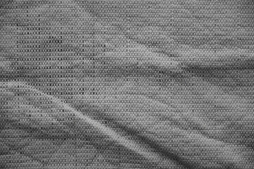 Processed image of fluffy gray doormat from bathroom in grey color