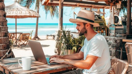 Young professional working on a laptop at a beachside cafe, digital nomad and remote work concpet .