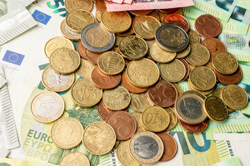 euro coins and banknotes,money background, different euro denominations, money texture, european currency,