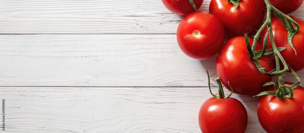 Aufkleber white wooden background with vibrant red fresh tomatoes creating a beautiful copy space image