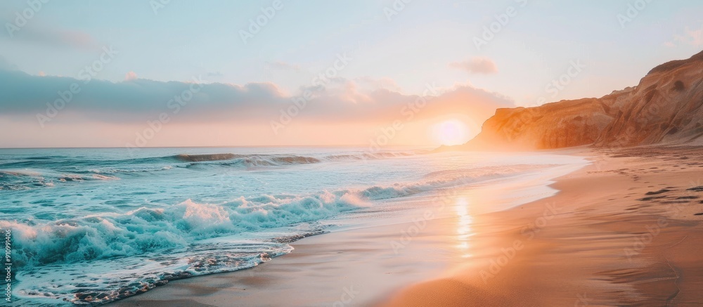 Poster Coastline at sunset with a view of the ocean and a sandy beach with a copy space image