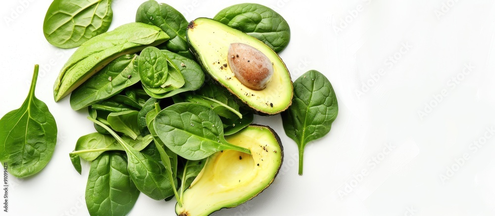 Poster a vegan healthy avocado and spinach salad is set against a white background with ample copy space im