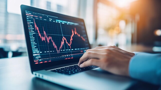 A financial analyst reviews a stock portfolio on a laptop, with graphs and charts displaying dividend growth over time. The image highlights the significance of dividends in stock investment returns,