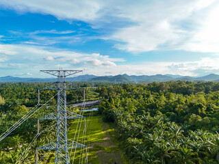 Aerial view High voltage with beautiful clouds sky. Photo for industrial use, electrical power...