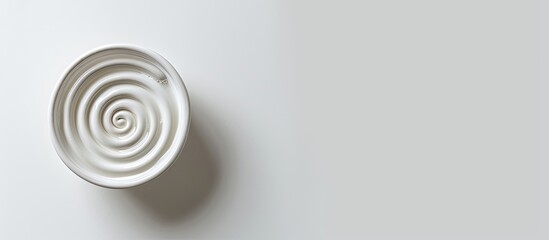 Mosquito repellent in a spiral shape on a white background with copy space image