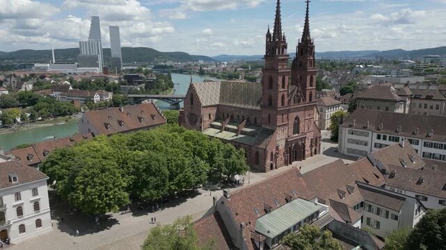 4K Drone Video of Gothic Church and Bridge along Rhine River in Basel, Switzerland (Pedestal Up)