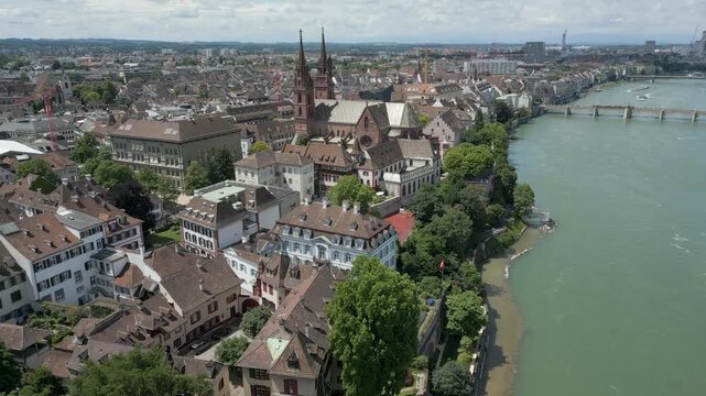 4K Drone Video of Gothic Church near Wettsteinbr&uuml;cke Bridge on the Rhine River in Basel, Switzerland (Dolly Back)
