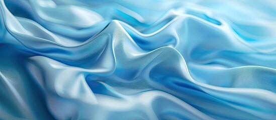 Obraz premium Blurred abstract background created by a blue fabric with wavy patterns suitable for a copy space image