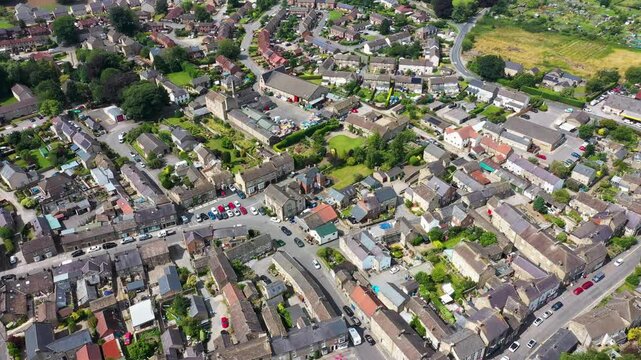 Aerial footage of the beautiful town of Masham, Ripon in North Yorkshire in the UK showing the British countryside town from above in the summer time