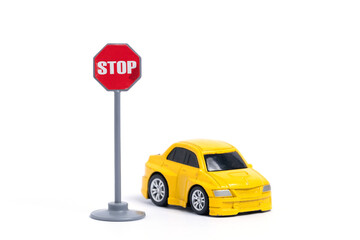 Yellow car with stop sign isolated on white background.
