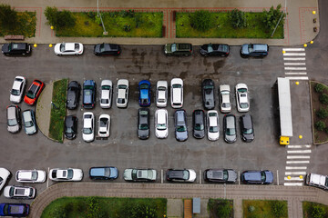 Car parking near the house is filmed from above