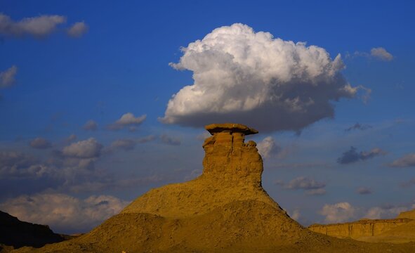 Stunning rock formation under a cloud on a sunny day in Hingol National Park, Pakistan