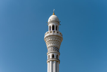 one minaret of traditional Islamic mosque in Grozny Chechnya