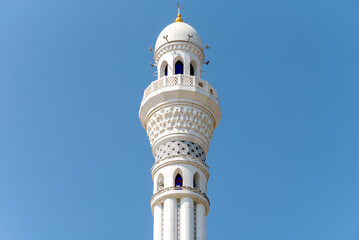 one minaret of traditional Islamic mosque in Grozny Chechnya