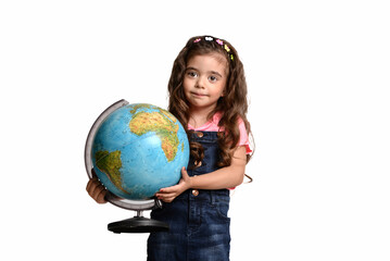 Smiling happy little  girl holding globe with care and love  in white background