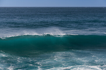 Surf waves of the ocean off the coast of the island of Lanzarote, Canary Islands