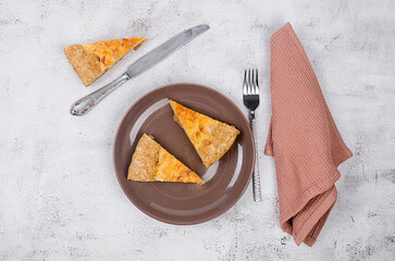 quiche Lorraine with chicken, mushrooms on the table