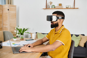 A man experiences virtual reality while seated at his workspace.