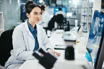 Computer, woman and medical scientist in laboratory with online research for cancer clinical trial....
