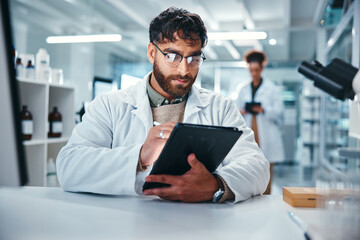 Report, science and tablet with man in laboratory for development, innovation or research....
