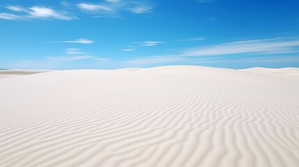 Naklejka premium Beautiful white sand dunes on a background of the blue sky