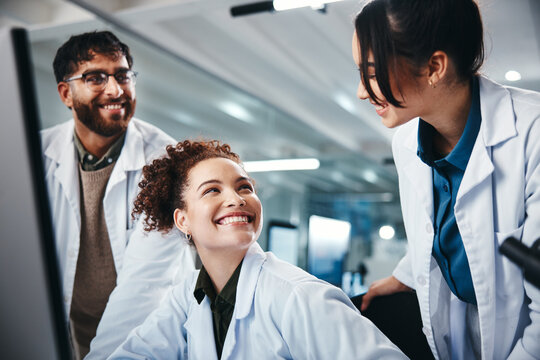 Science, employees and computer with teamwork, research and online reading with medical cure. Talking, researchers and pc with internet, email and approval for lab funding or collaboration with group