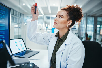 Scientist, blood and woman in laboratory with test tube for research, experiment or DNA analysis....