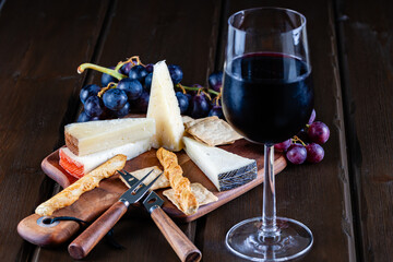 cheese plate and a glass of wine