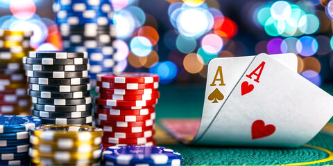 Obraz premium glowing lights casino chips and cards s Poker cards floating, gambling and casino concept, banner copy space ,AI.