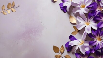 purple flowers are in a glass vase and some leaves scattered on the surface, above a mirror