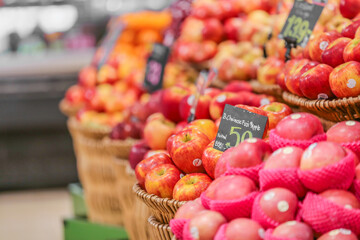 pile of fruits at a grocery store Colourful fruit and vegetable market stall in a rustic display	