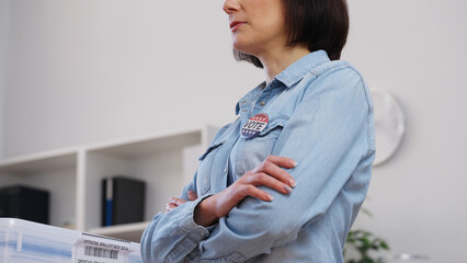 Responsible activist observing the election process at a polling station, democracy