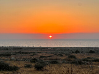 sunset over the sea in san vito lo capo,sicily,italy,