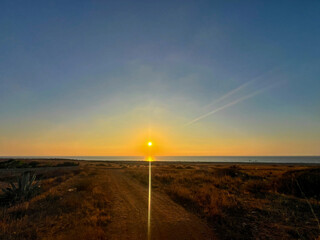 sunset over the sea in san vito lo capo,sicily,italy,
