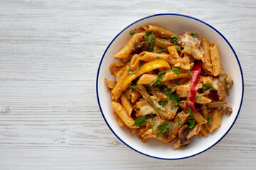 Homemade Fajita Pasta Bake on a Plate, top view. Flat lay, overhead, from above. Copy space.