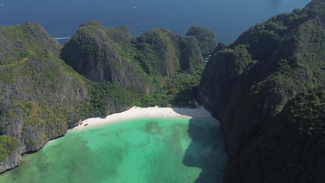 World famous Maya Bay on Phi Phi Ley island, view from high altitude of the beach and limestone cliffs